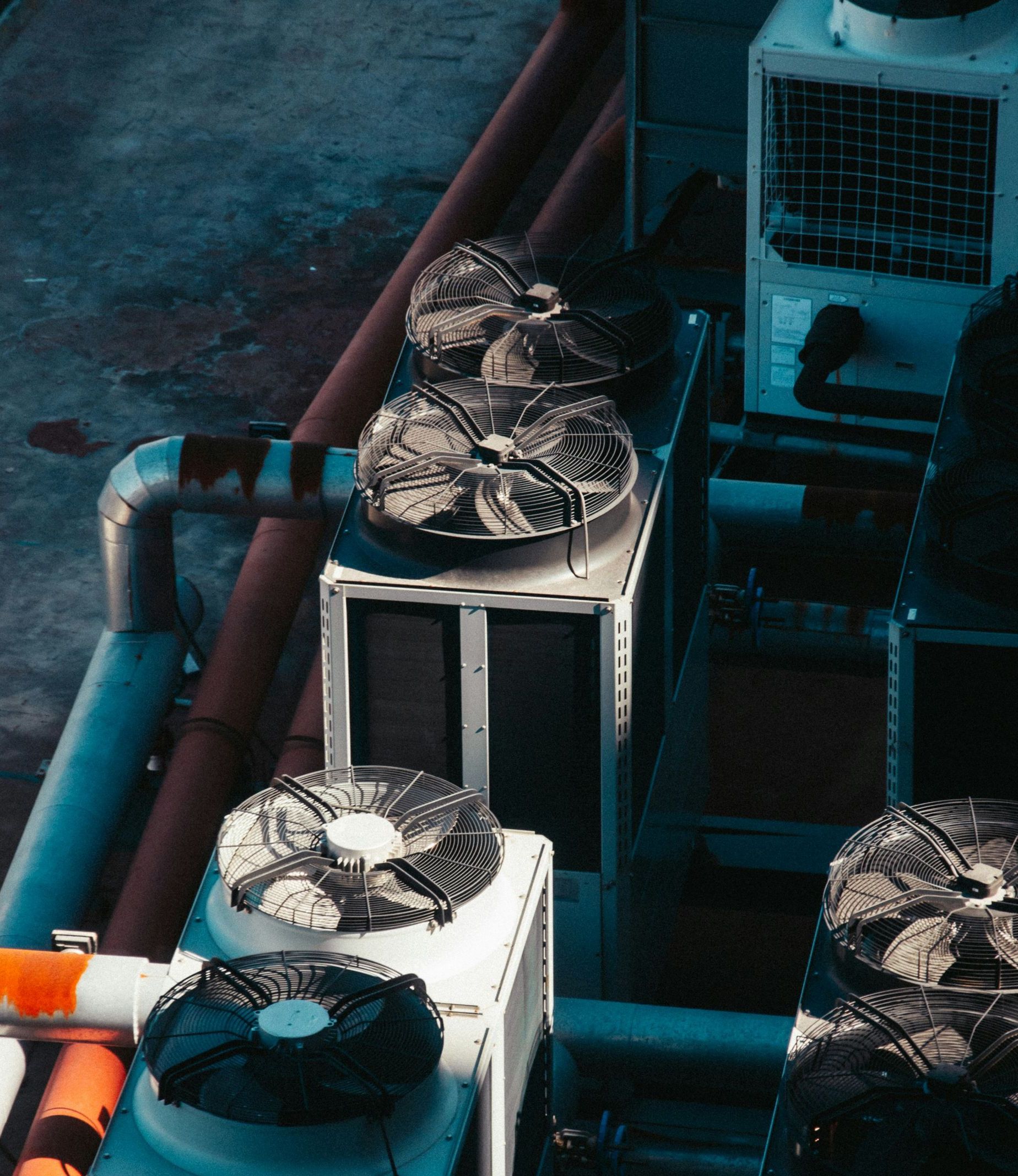 a group of air conditioners sitting next to each other